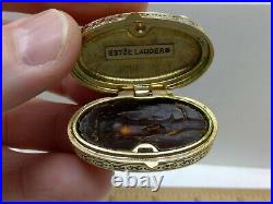 Pair of Vintage Estee Lauder Solid Perfume Compact Nesting Duck Cases